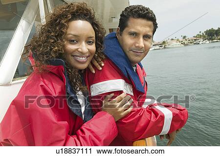 Couple on yacht, (portrait) View Large Photo Image Stock Image - Couple on yacht, (portrait). Fotosearch