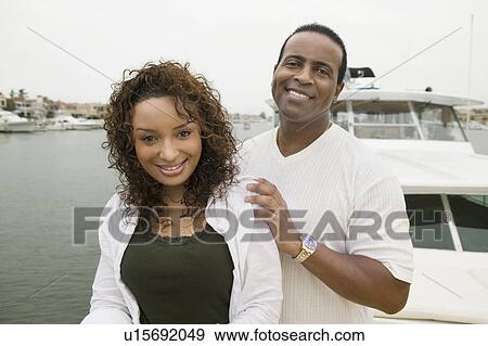 Couple on yacht, (portrait) View Large Photo Image Stock Photo - Couple on yacht, (portrait). Fotosearch