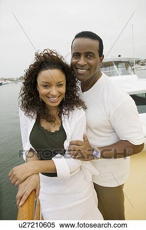 Stock Photography - Couple on yacht, (portrait). Fotosearch