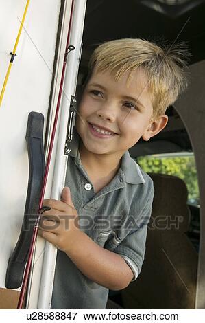Stock Photo - Cute Boy in RV. Fotosearch