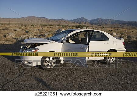 Damaged car in desert View Large Photo Image Stock Image - Damaged car in desert. Fotosearch