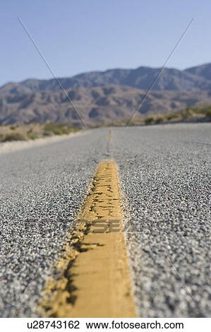 Stock Image - Dividing line on highway. Fotosearch
