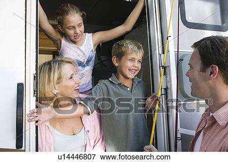 Family in camper van View Large Photo Image Stock Photo - Family in camper van. Fotosearch