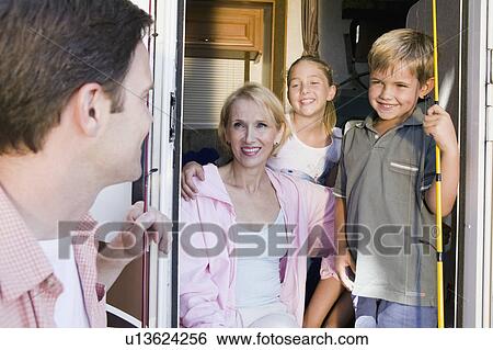 Family in camper van View Large Photo Image Stock Photograph - Family in camper van. Fotosearch