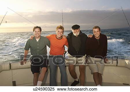 Family on fishing boat, (portrait) View Large Photo Image Stock Photography - Family on fishing boat, (portrait). Fotosearch