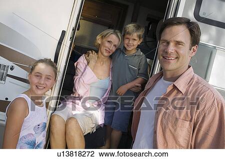Stock Image - Family on Vacation in RV. Fotosearch