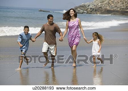 Family Walking Along Beach View Large Photo Image Stock Image - Family Walking Along Beach. Fotosearch