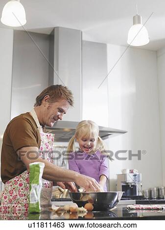 Father and Daughter Cooking in Kitchen View Large Photo Image Stock Image - Father and Daughter Cooking in Kitchen. Fotosearch