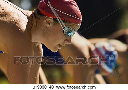 Female swimmers on starting blocks View Large Photo Image Stock Image - Female swimmers on starting blocks. Fotosearch
