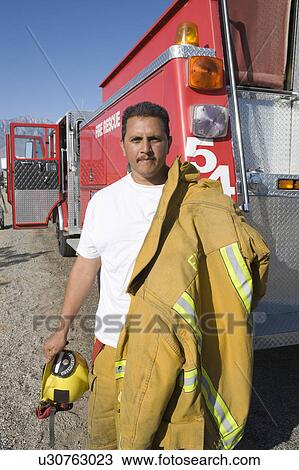 Firefighter and truck View Large Photo Image Stock Image - Firefighter and truck. Fotosearch