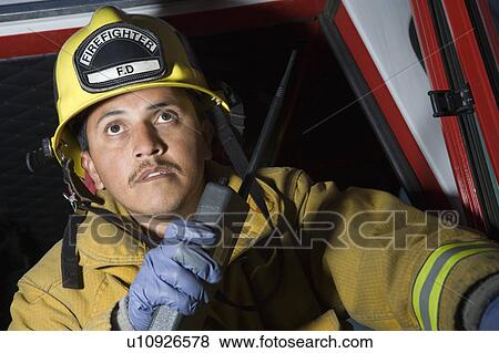 firefighter with two-way radio View Large Photo Image Stock Photo - firefighter with two-way radio. Fotosearch