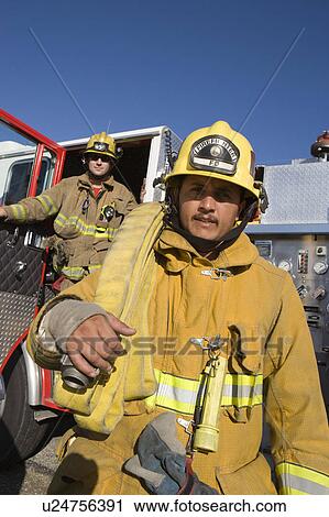 Firefighters and truck View Large Photo Image Stock Image - Firefighters and truck. Fotosearch