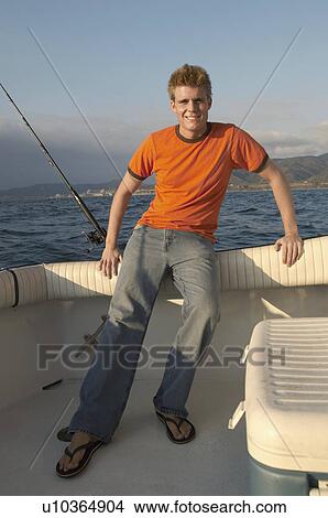 Fisherman on boat, (portrait) View Large Photo Image Picture - Fisherman on boat, (portrait). Fotosearch