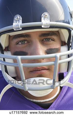 Stock Image - Football Player in helmet, close-up, portrait, (close-up), (portrait). Fotosearch