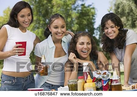 Four women at picnic. View Large Photo Image Stock Photo - Four women at picnic.. Fotosearch
