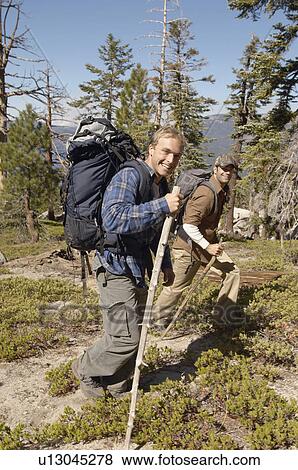 Stock Photo - Friends hiking, (portrait). Fotosearch