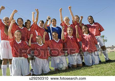 Stock Image - Girls' soccer team (13-17). Fotosearch