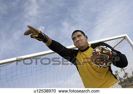 Goalkeeper pointing, portrait View Large Photo Image Stock Image - Goalkeeper pointing, portrait. Fotosearch