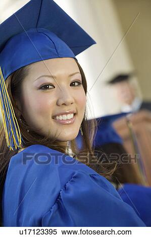 Graduate at ceremony, portrait View Large Photo Image Stock Photography - Graduate at ceremony, portrait. Fotosearch