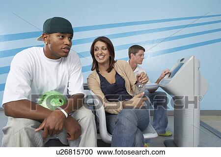 Group of friends at bowling alley View Large Photo Image Stock Image - Group of friends at bowling alley. Fotosearch