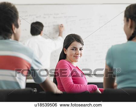 High school students sitting in classroom View Large Photo Image Stock Photograph - High school students sitting in classroom. Fotosearch