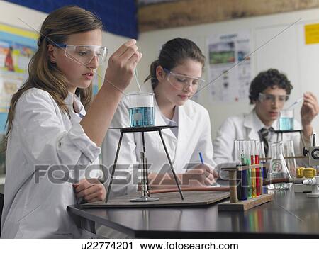 Stock Image - High School Students Studying in Laboratory. Fotosearch