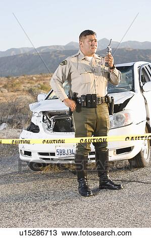 Highway patrol officer at scene of crime View Large Photo Image Stock Image - Highway patrol officer at scene of crime. Fotosearch