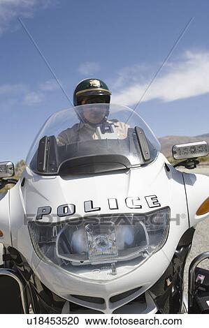 Highway patrol officer with motorcycle View Large Photo Image Stock Image - Highway patrol officer with motorcycle. Fotosearch