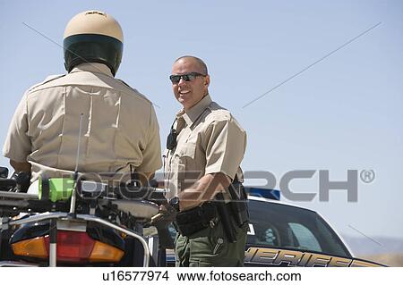 Picture - Highway patrol officers. Fotosearch