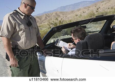 Male driver fills out patrol ticket View Large Photo Image Stock Photograph - Male driver fills out patrol ticket. Fotosearch
