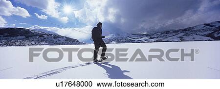 Man Hiking Through Snow View Large Photo Image Stock Image - Man Hiking Through Snow. Fotosearch