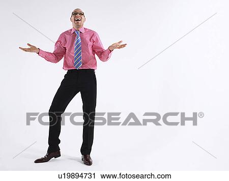 Stock Image - Man in glasses laughing. Fotosearch
