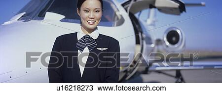 Member of Flight Crew Standing by Airplane View Large Photo Image Stock Image - Member of Flight Crew Standing by Airplane. Fotosearch