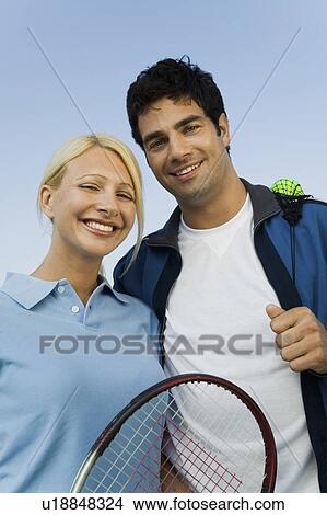 Picture - Mixed doubles tennis players, portrait. Fotosearch