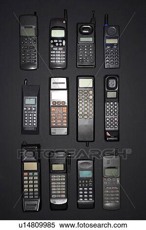 Mobile phones in rows, view from above View Large Photo Image Stock Photography - Mobile phones in rows, view from above. Fotosearch