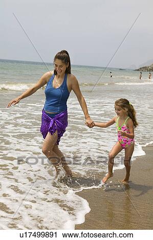Mother and Daughter Getting Feet Wet View Large Photo Image Stock Image - Mother and Daughter Getting Feet Wet. Fotosearch