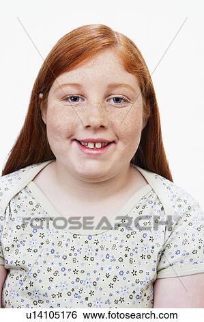 Stock Photograph - Overweight Girl (13-15) smiling, portrait. Fotosearch