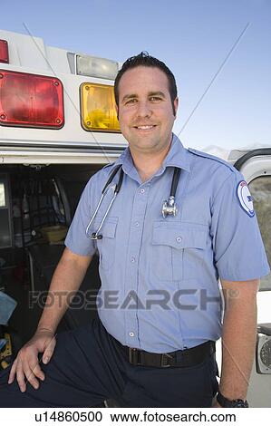 Stock Image - Paramedic and ambulance. Fotosearch