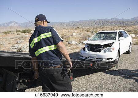 Stock Photo - Recovery services take away vehicle. Fotosearch