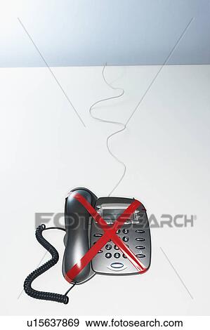 Red tape forming a letter x on telephone, elevated view View Large Photo Image Stock Photo - Red tape forming a letter x on telephone, elevated view. Fotosearch