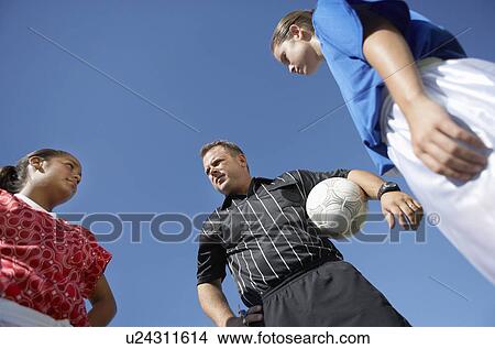Picture - Referee and Soccer Players. Fotosearch