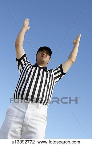 Referee Signalling Touchdown, low angle view, (low angle view) View Large Photo Image Stock Image - Referee Signalling Touchdown, low angle view, (low angle view). Fotosearch