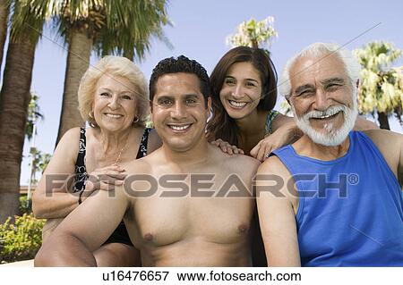 Senior couple and mid-adult couple outdoors, front view portrait. View Large Photo Image Stock Photo - Senior couple and mid-adult couple outdoors, front view portrait.. Fotosearch