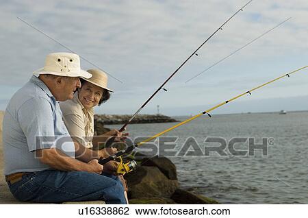 Senior Couple Fishing at the Beach View Large Photo Image Stock Image - Senior Couple Fishing at the Beach. Fotosearch