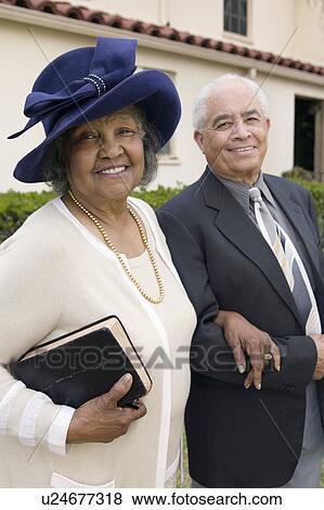Stock Photo - Senior Couple Going to Church on Sunday, portrait. Fotosearch
