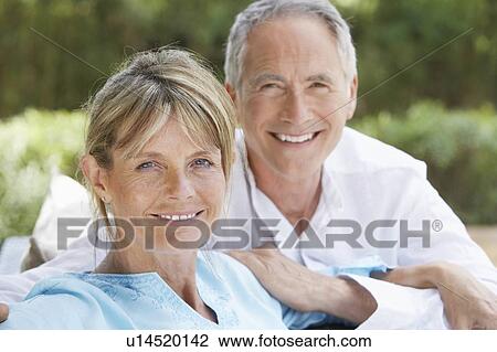 Stock Image - Senior Couple in Garden. Fotosearch