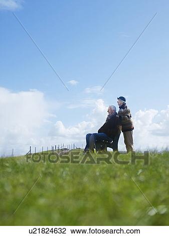 Senior couple in park View Large Photo Image Stock Image - Senior couple in park. Fotosearch