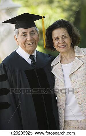 Senior Graduate and Wife outside, portrait View Large Photo Image Stock Photography - Senior Graduate and Wife outside, portrait. Fotosearch