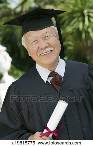 Stock Photography - Senior Graduate outside, portrait. Fotosearch