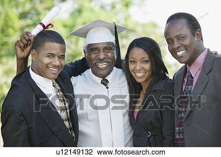 Senior graduate with son and grandchildren outside, portrait View Large Photo Image Stock Image - Senior graduate with son and grandchildren outside, portrait. Fotosearch